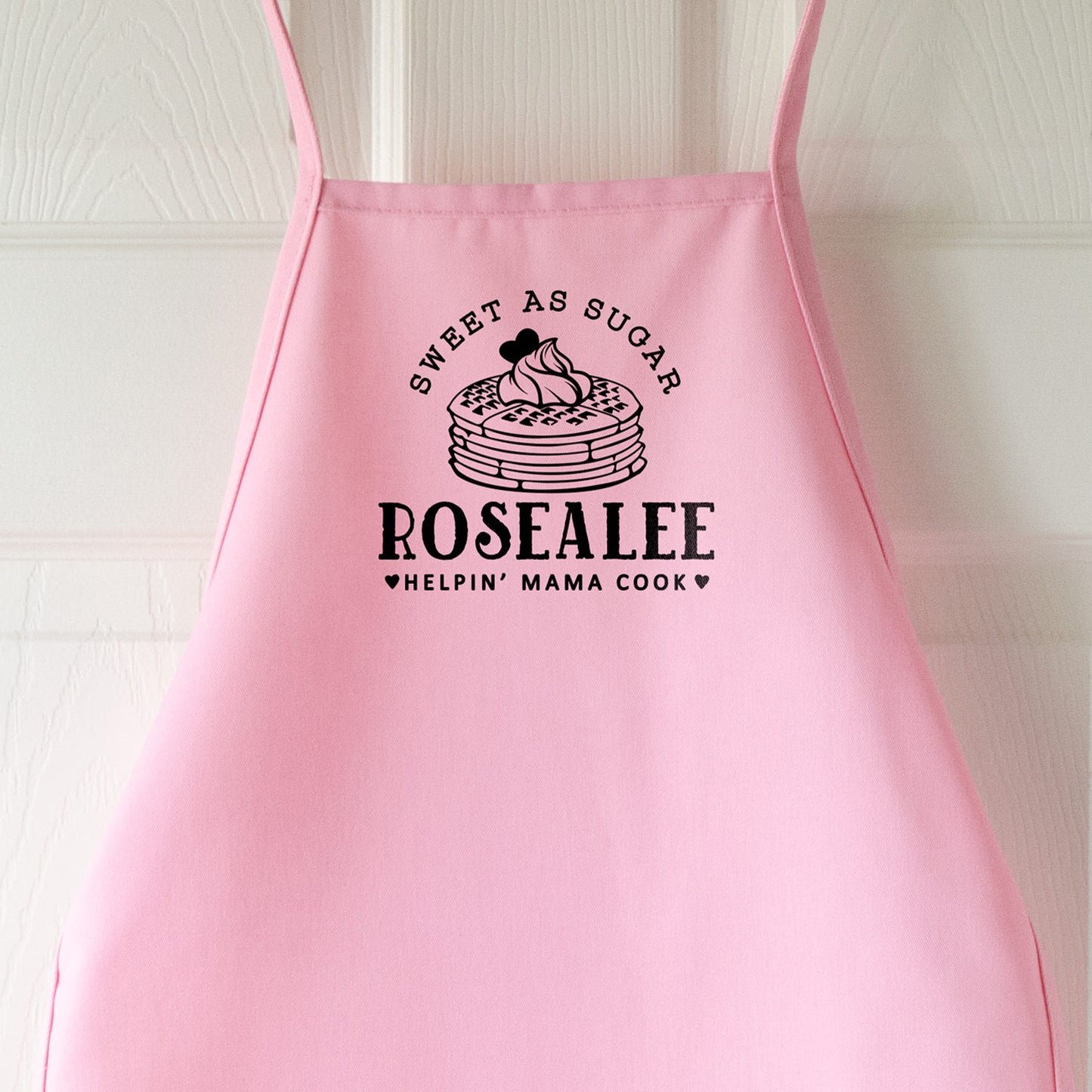 
                  
                    a customized breakfast waffle apron for kids, in pink pastel
                  
                
