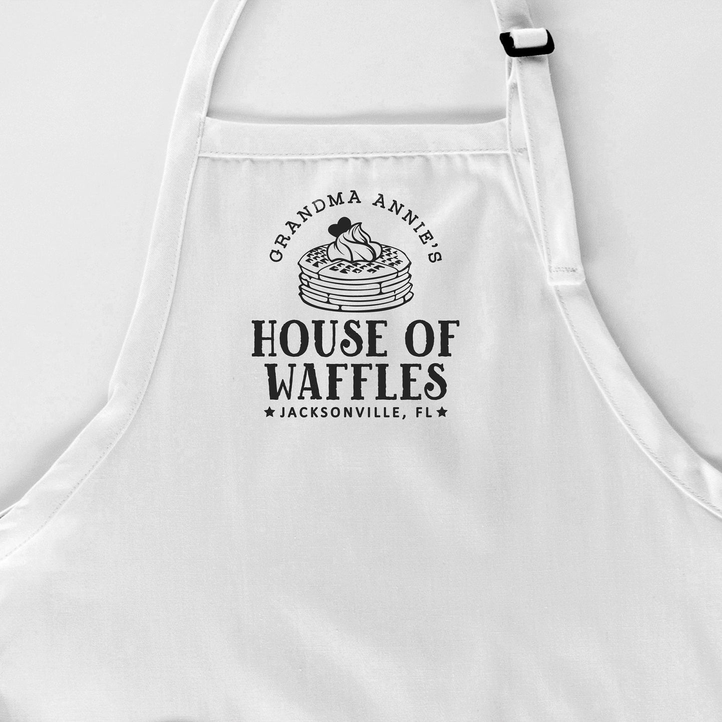 
                  
                    a customized breakfast waffle apron in white
                  
                