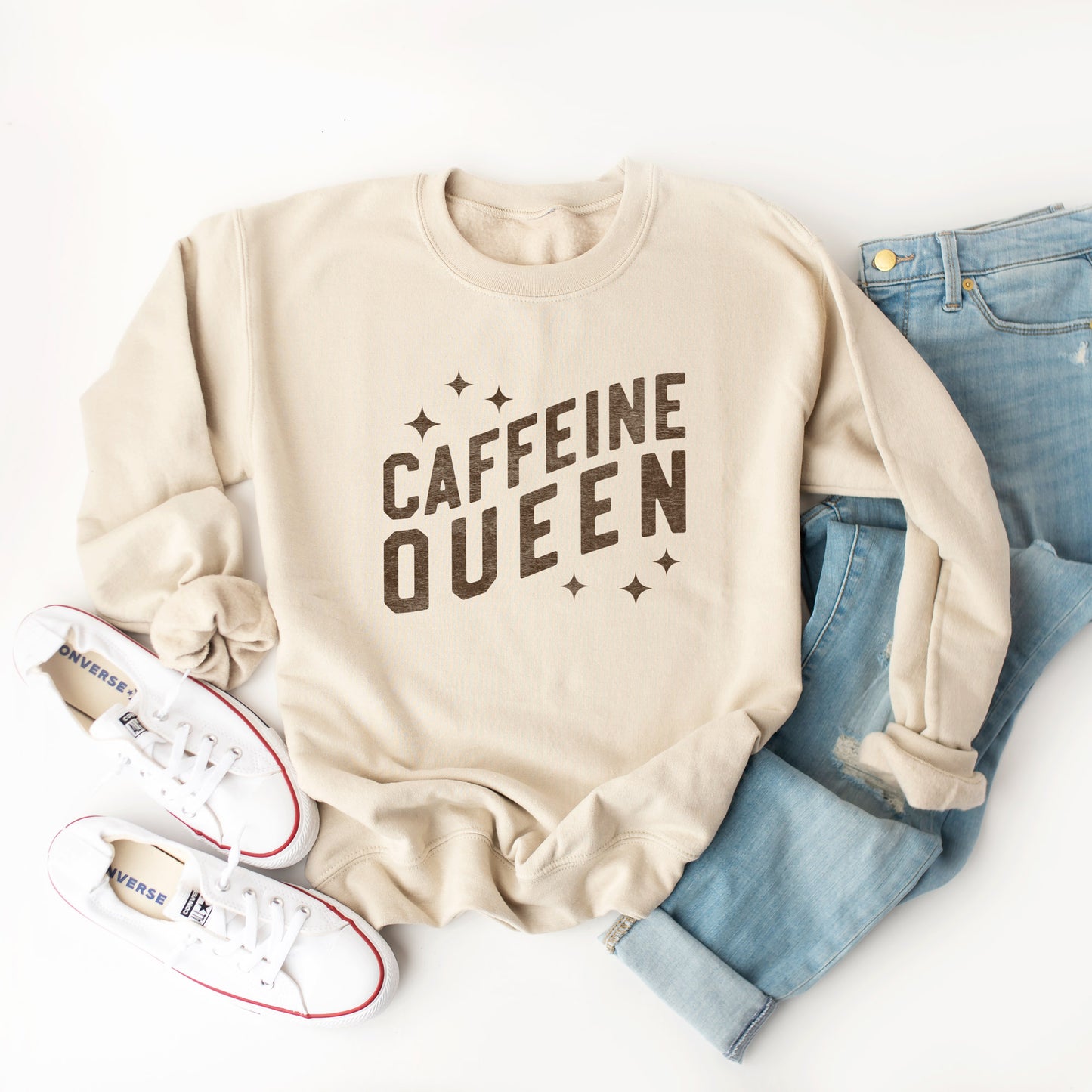 A caffeine queen sweatshirt in Sand