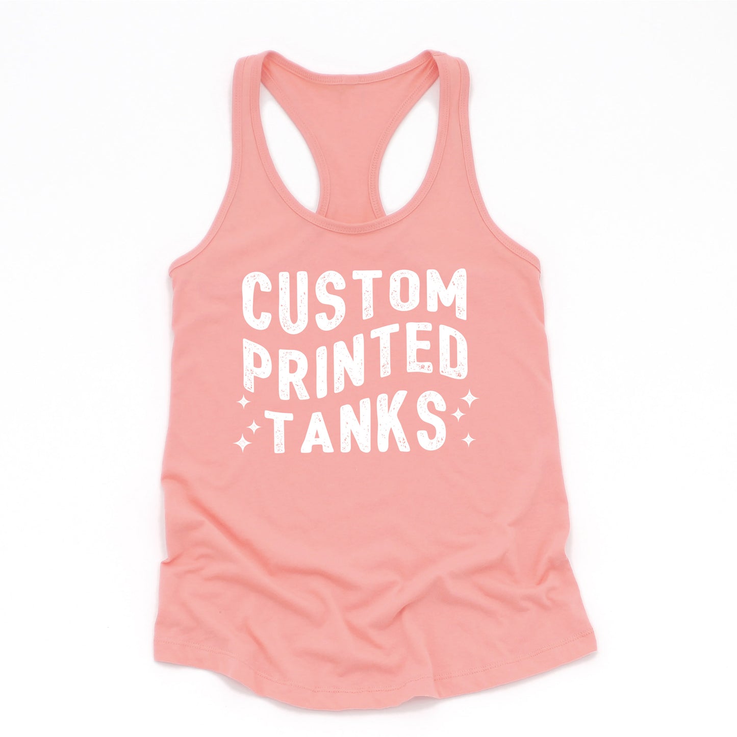 
                  
                    a custom printed racerback tank in desert pink
                  
                