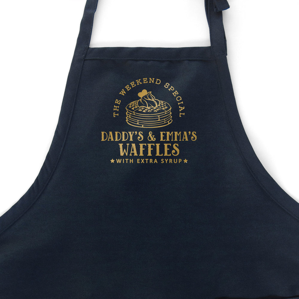 
                  
                    a customized breakfast waffle apron in navy
                  
                