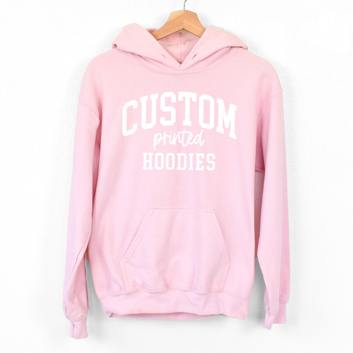 
                  
                    a custom printed hoodie in light pink
                  
                