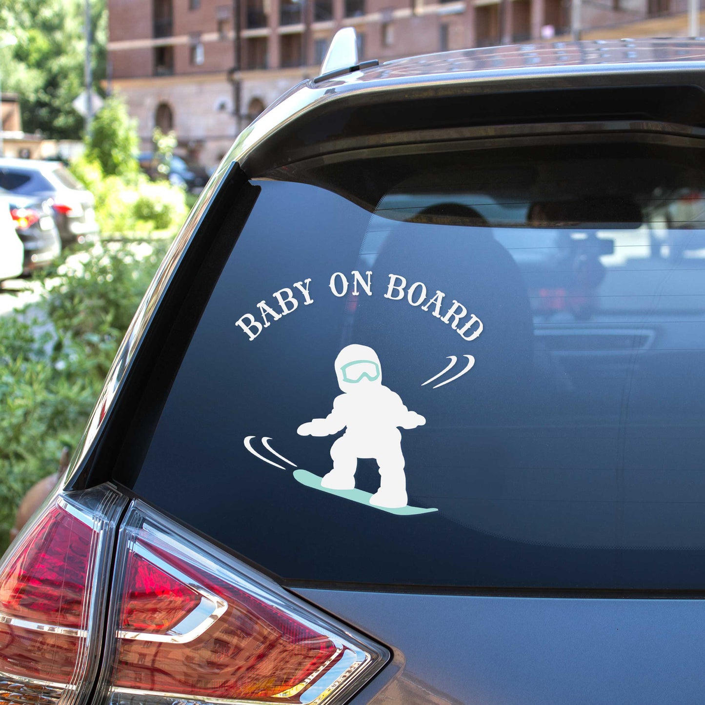 
                  
                    baby on snowboard svg decal on a SUV back window
                  
                