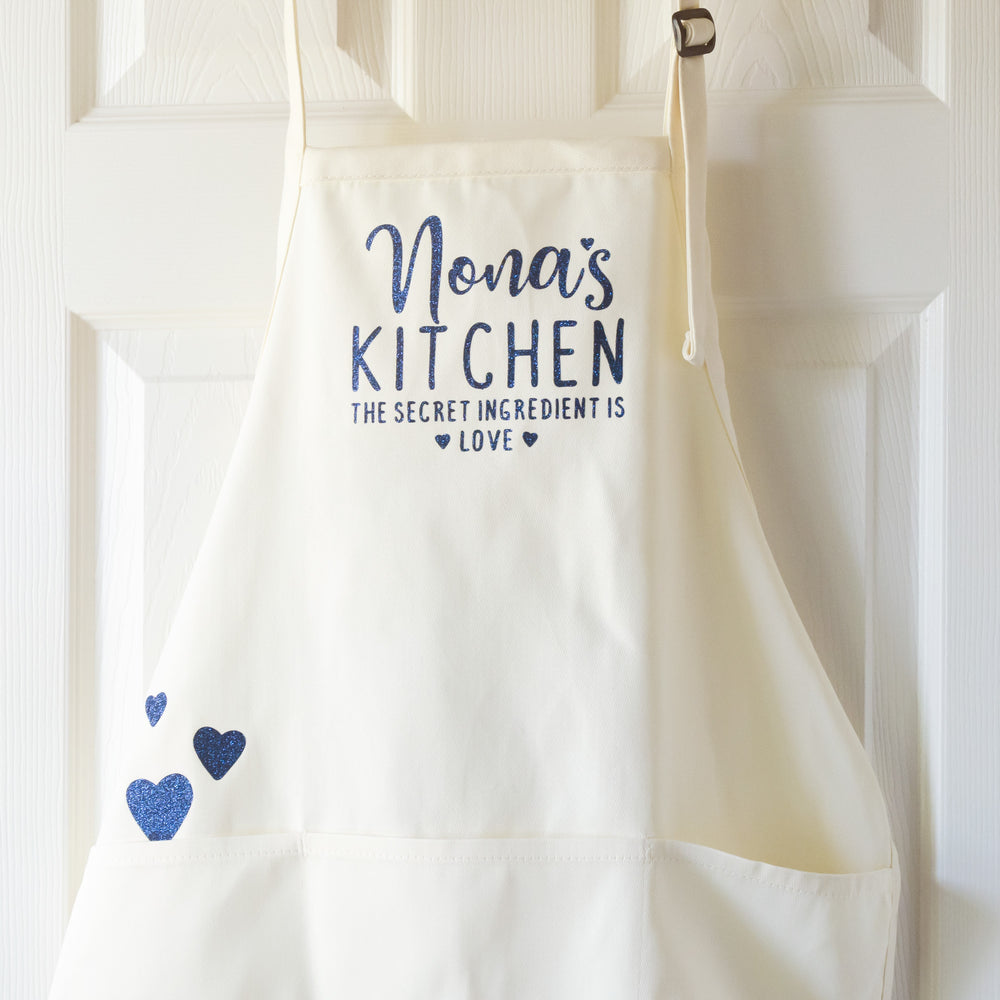 
                  
                    a personalized kitchen apron for women shown in natural
                  
                