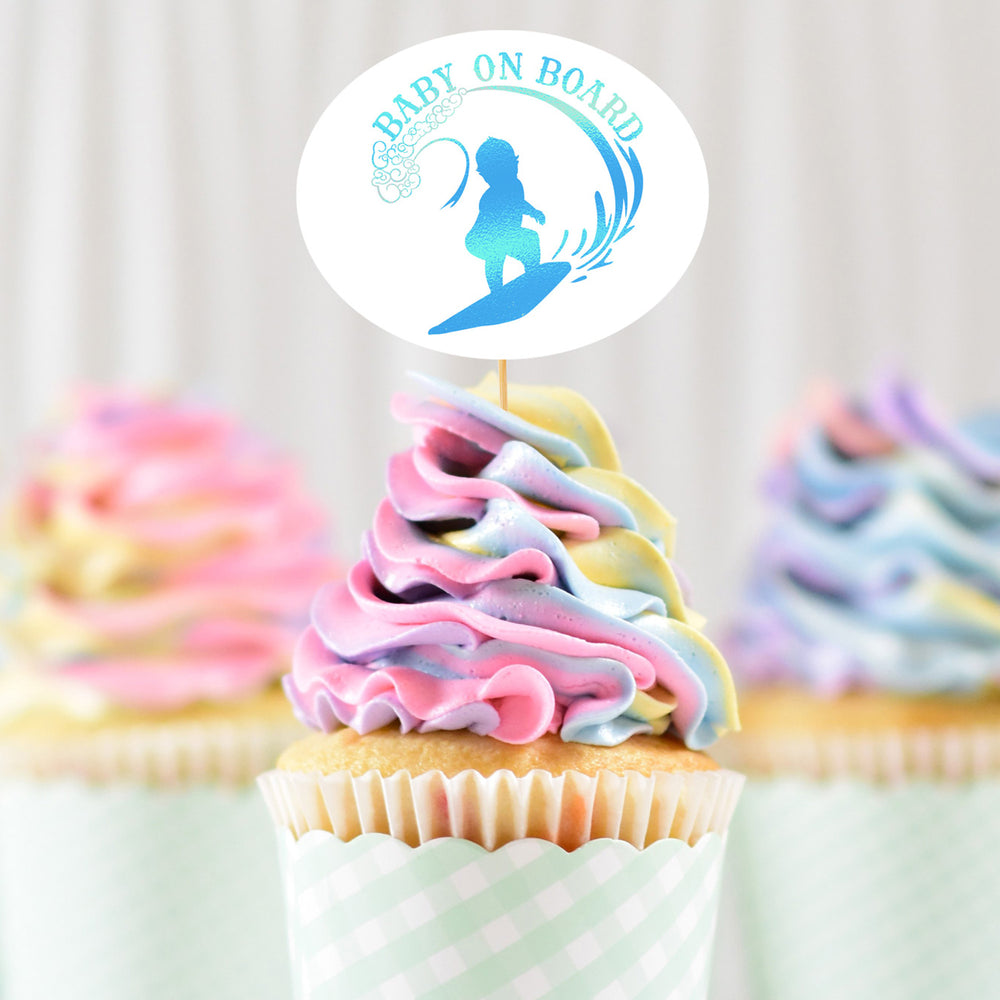 
                  
                    pastel swirl cupcakes with a Baby On Board Surfing Boy SVG cupcake topper in holographic blue
                  
                