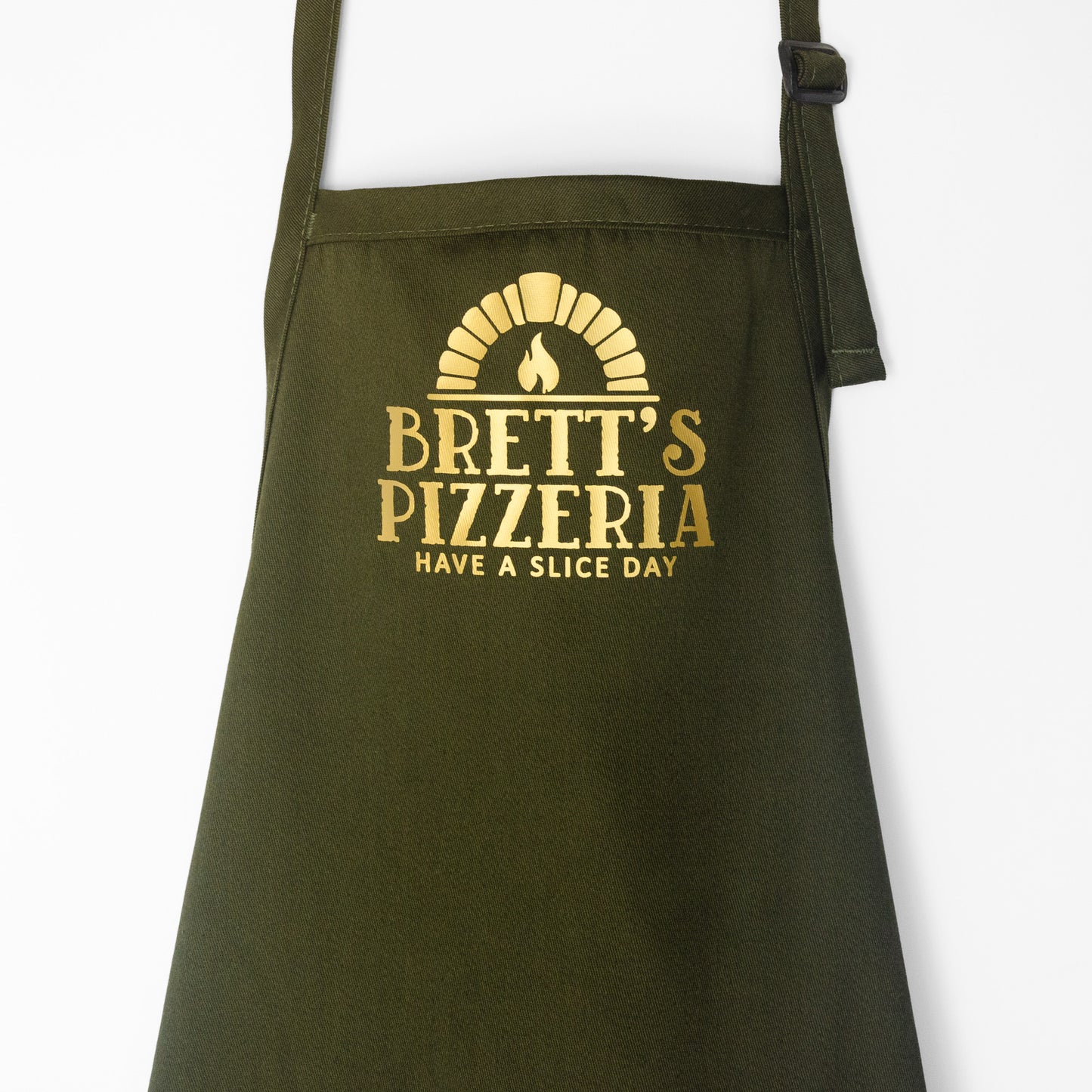 
                  
                    a personalized pizza oven apron in green
                  
                