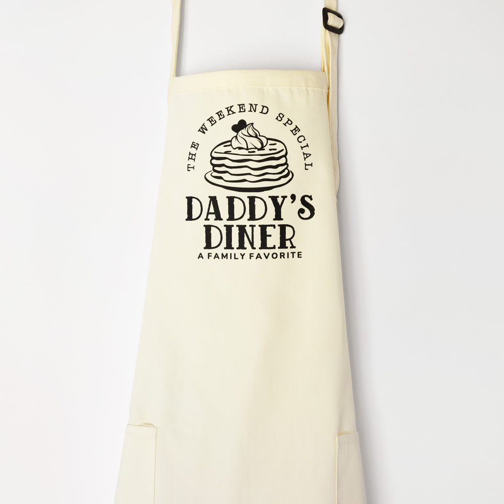 
                  
                    a personalized pancake apron in natural
                  
                