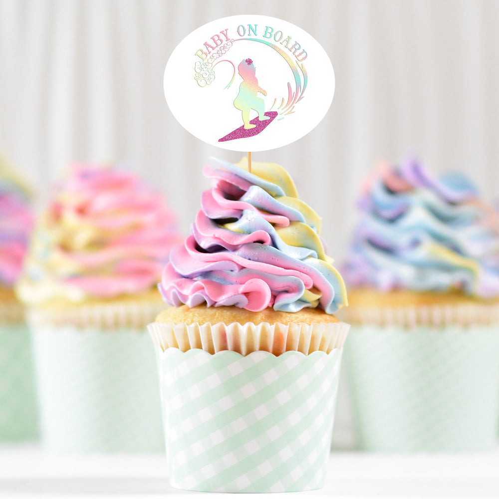 
                  
                    pastel swirl cupcakes with a cake topper printed with Baby On Board - Surfing Girl svg in holographic and glitter
                  
                