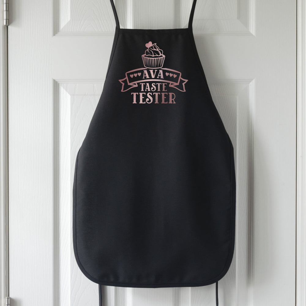 
                  
                    a personalized kid's cupcake taste tester apron in black
                  
                