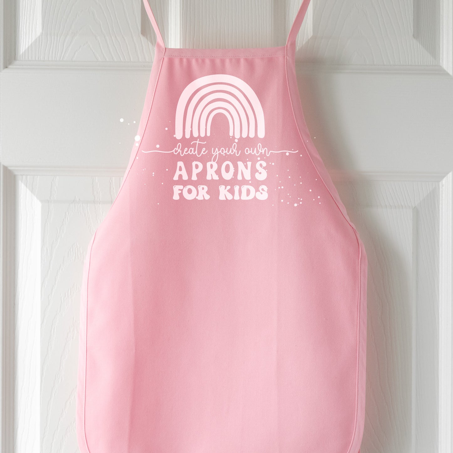 
                  
                    a kids apron in pink pastel
                  
                