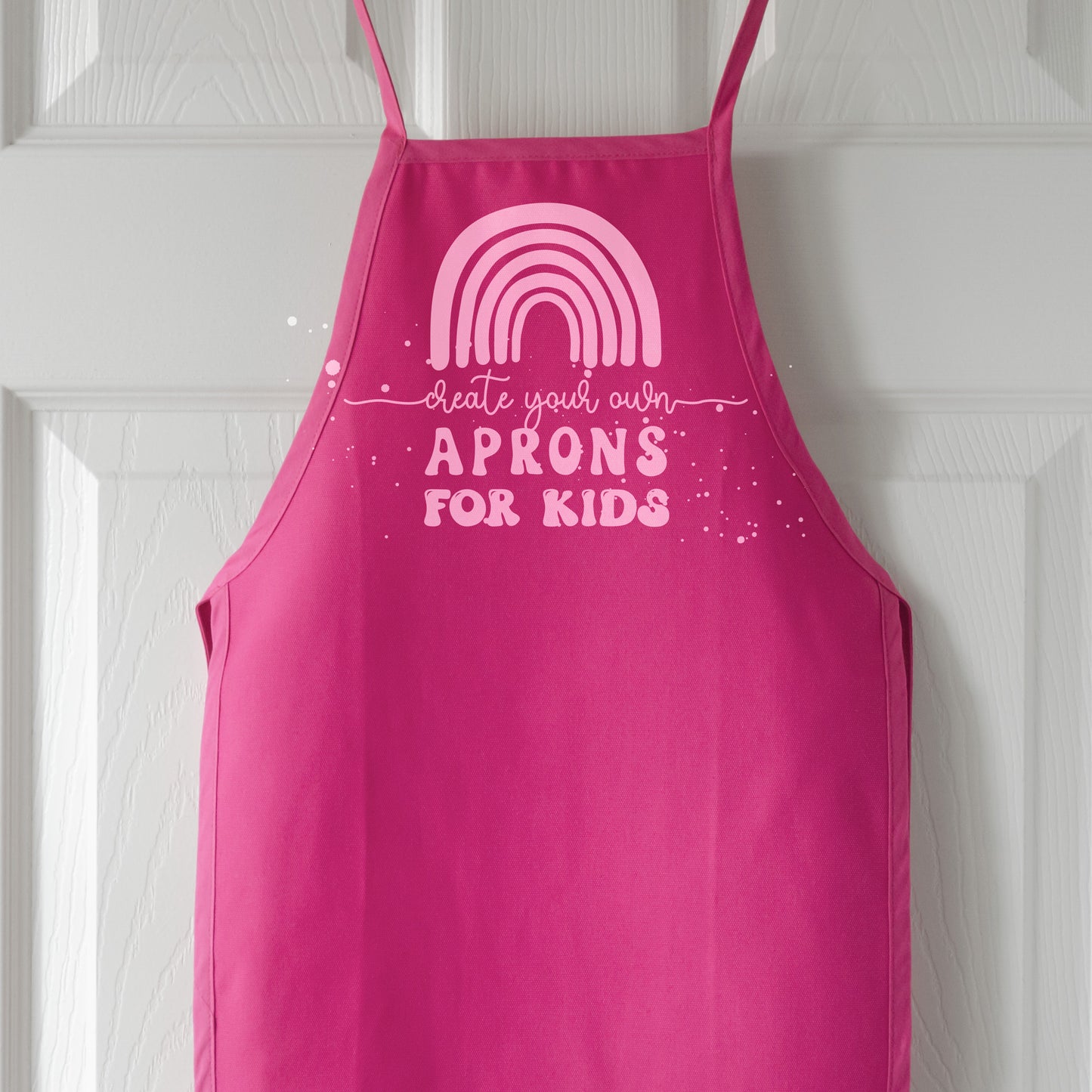 
                  
                    a kids apron in hot pink
                  
                