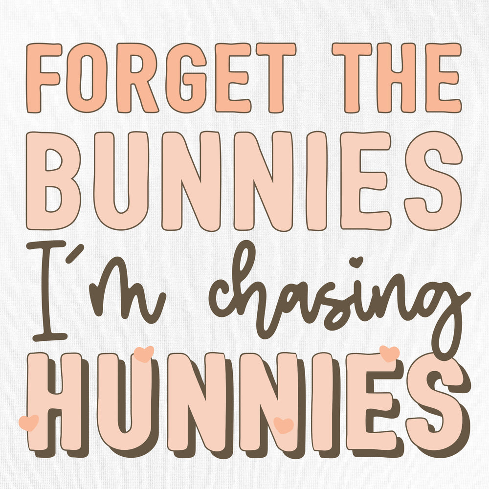 An Easter design that reads "forget the bunnies I'm chasing hunnies"