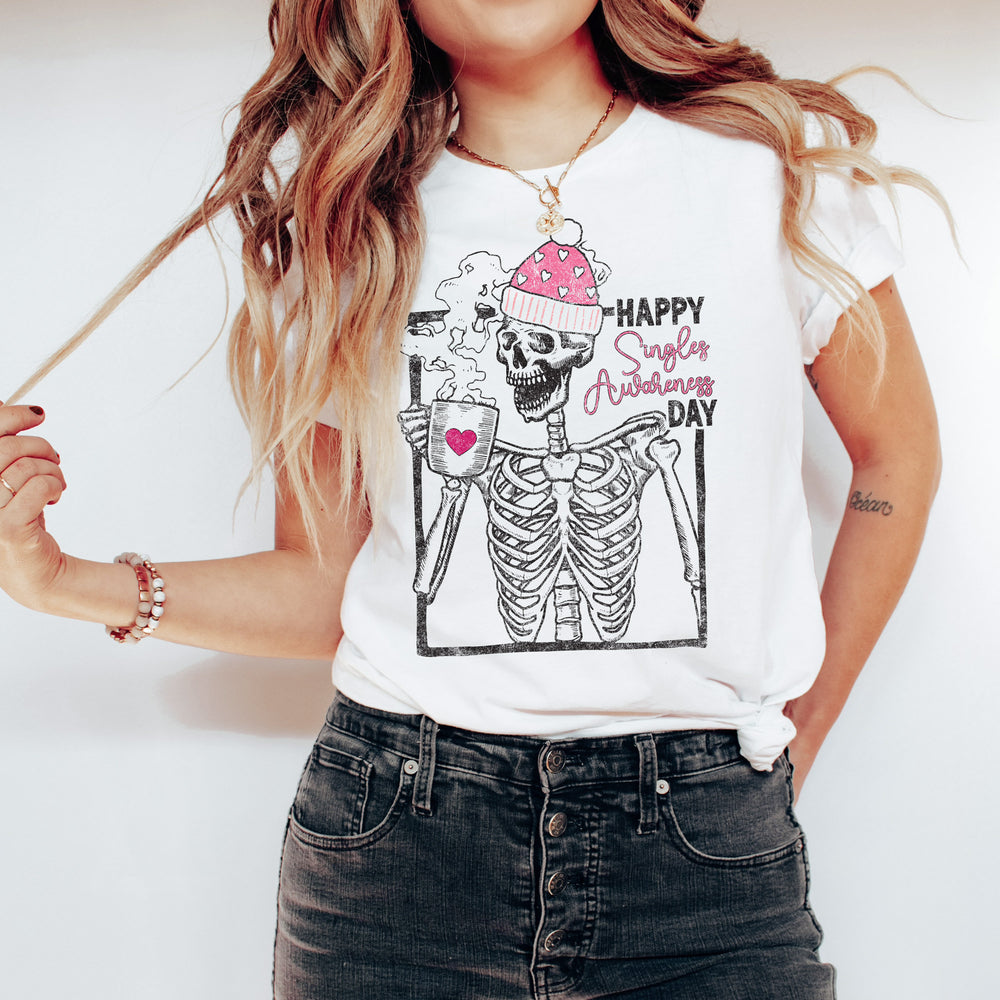 a pretty young woman wearing a Happy Singles Awareness Day shirt in white