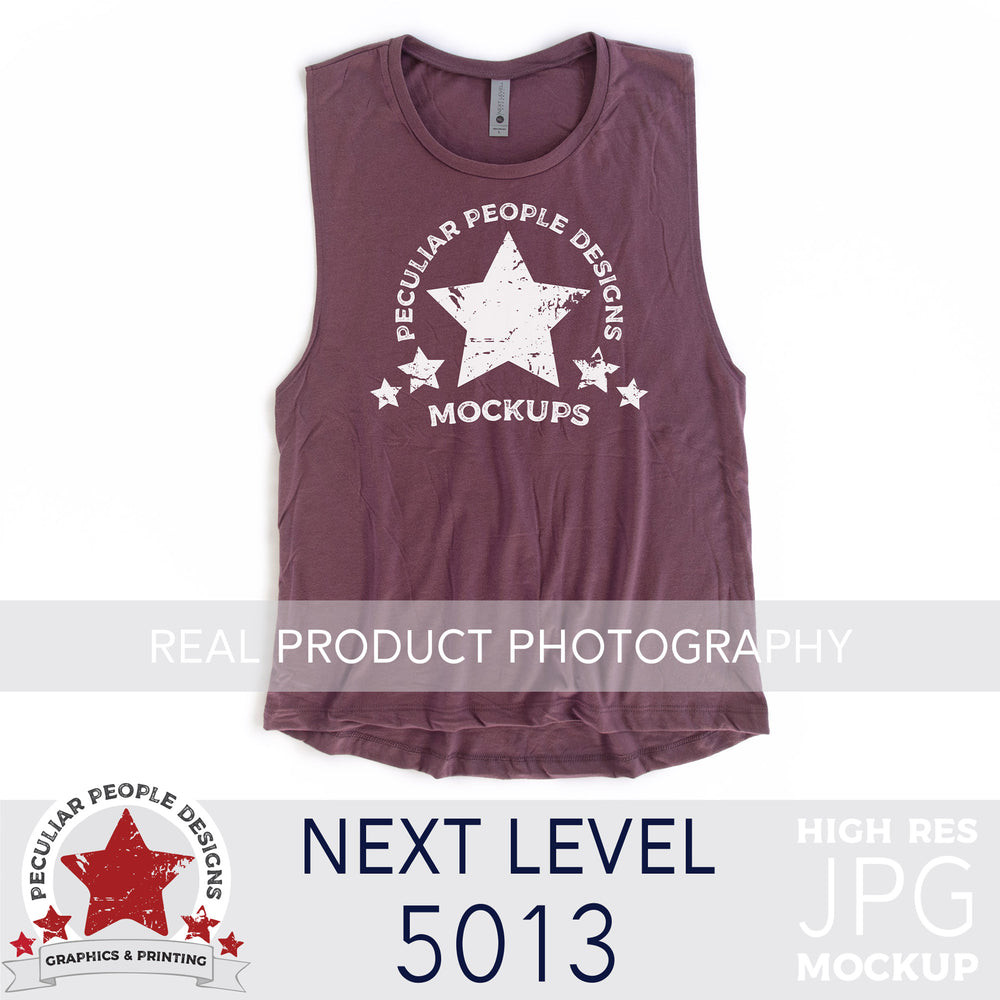a Shiraz, next level 5013 muscle tank flat lay mockup with a white background by peculiar people designs