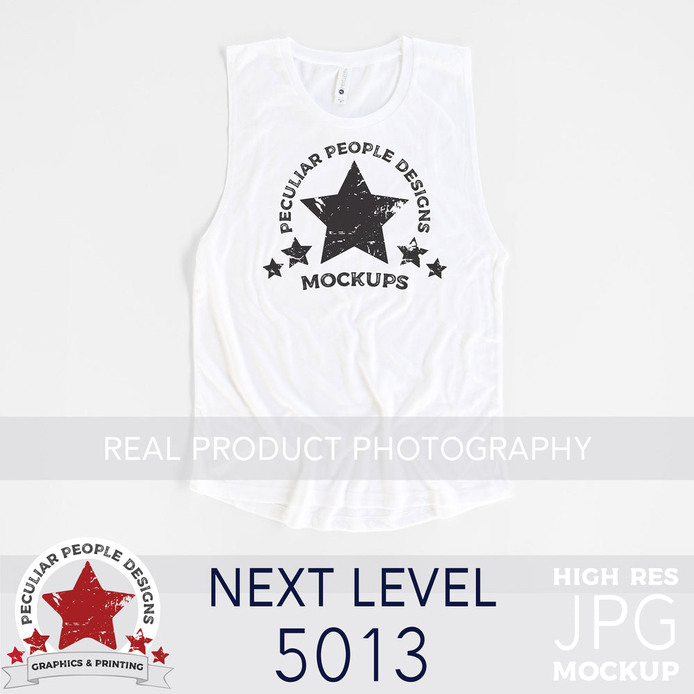 a White, next level 5013 festival muscle tank flat lay mockup with a grey background by peculiar people designs