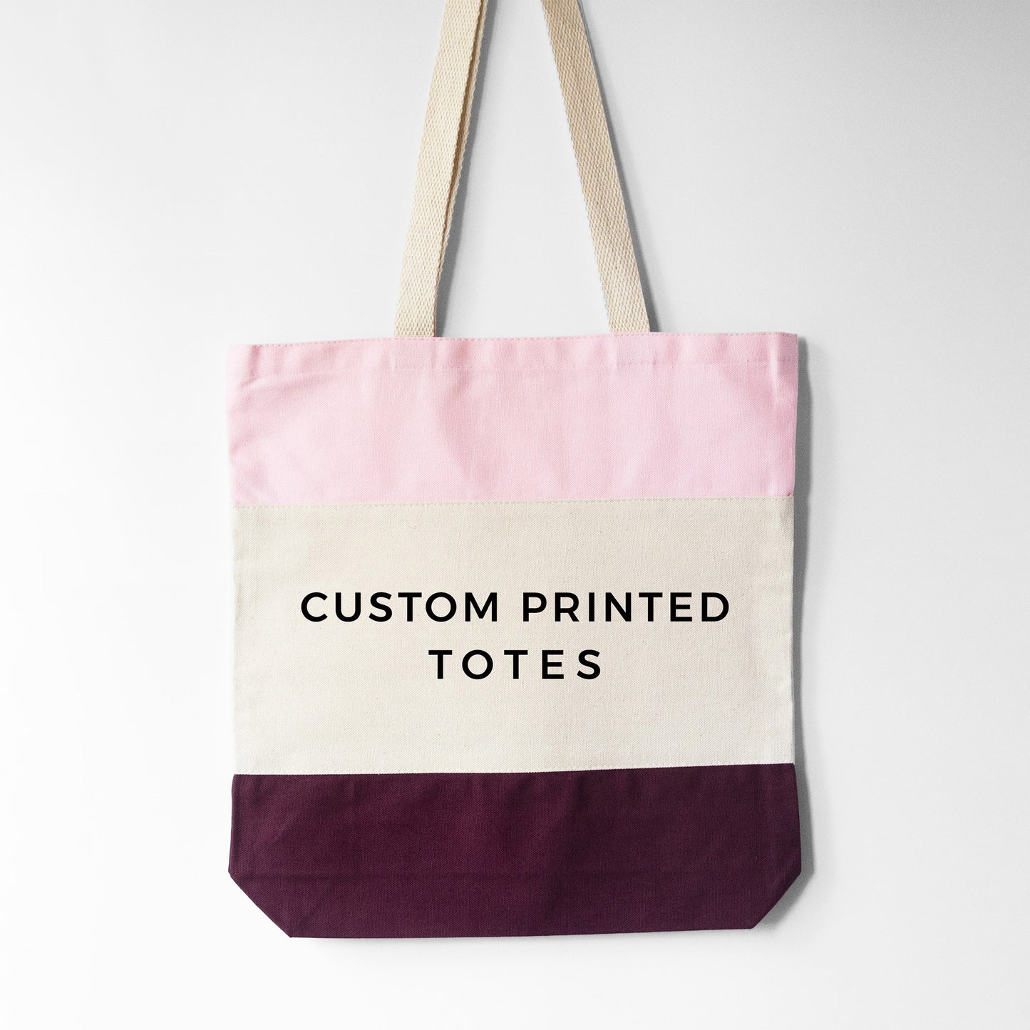 
                  
                    Design your own tri-color tote, shown in pink
                  
                