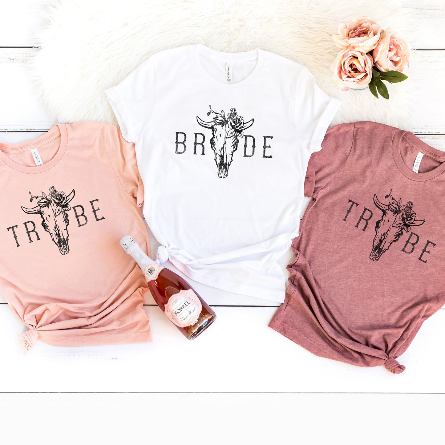
                  
                    Bride Tribe Bull Skull Bachelorette tees in white, peach and mauve
                  
                