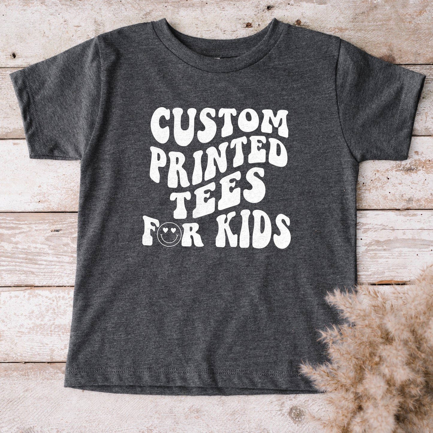 
                  
                    a custom printed kid's shirt in dark grey
                  
                