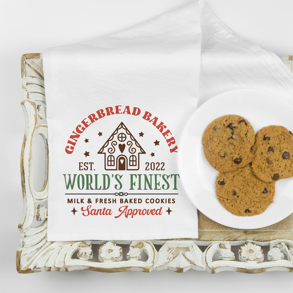 a customizable gingerbread bakery kitchen towel 