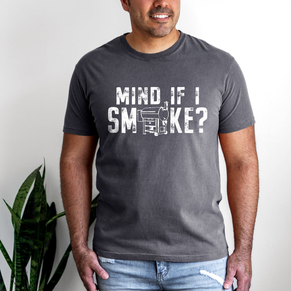 a handsome man wearing a Mind If I Smoke? t-shirt in pepper