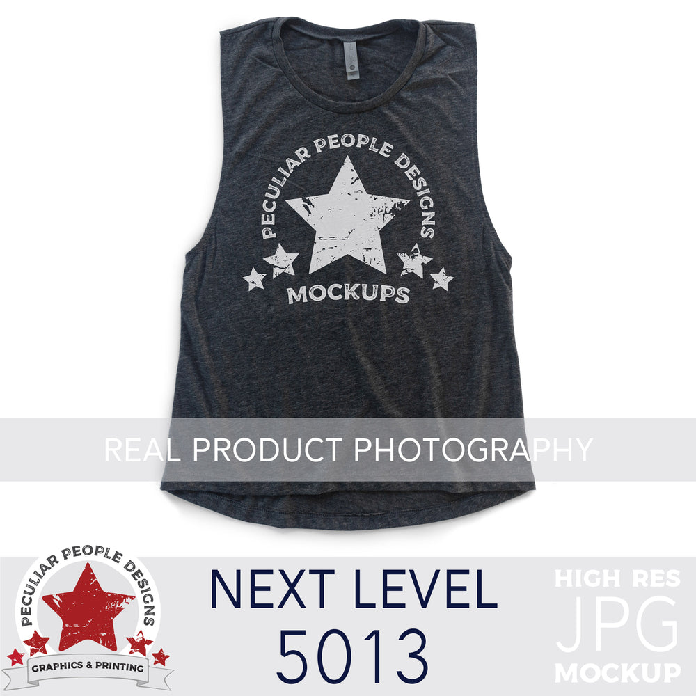 
                  
                    a Vintage Navy, next level 5013 muscle tank flat lay mockup with a white background by peculiar people designs
                  
                