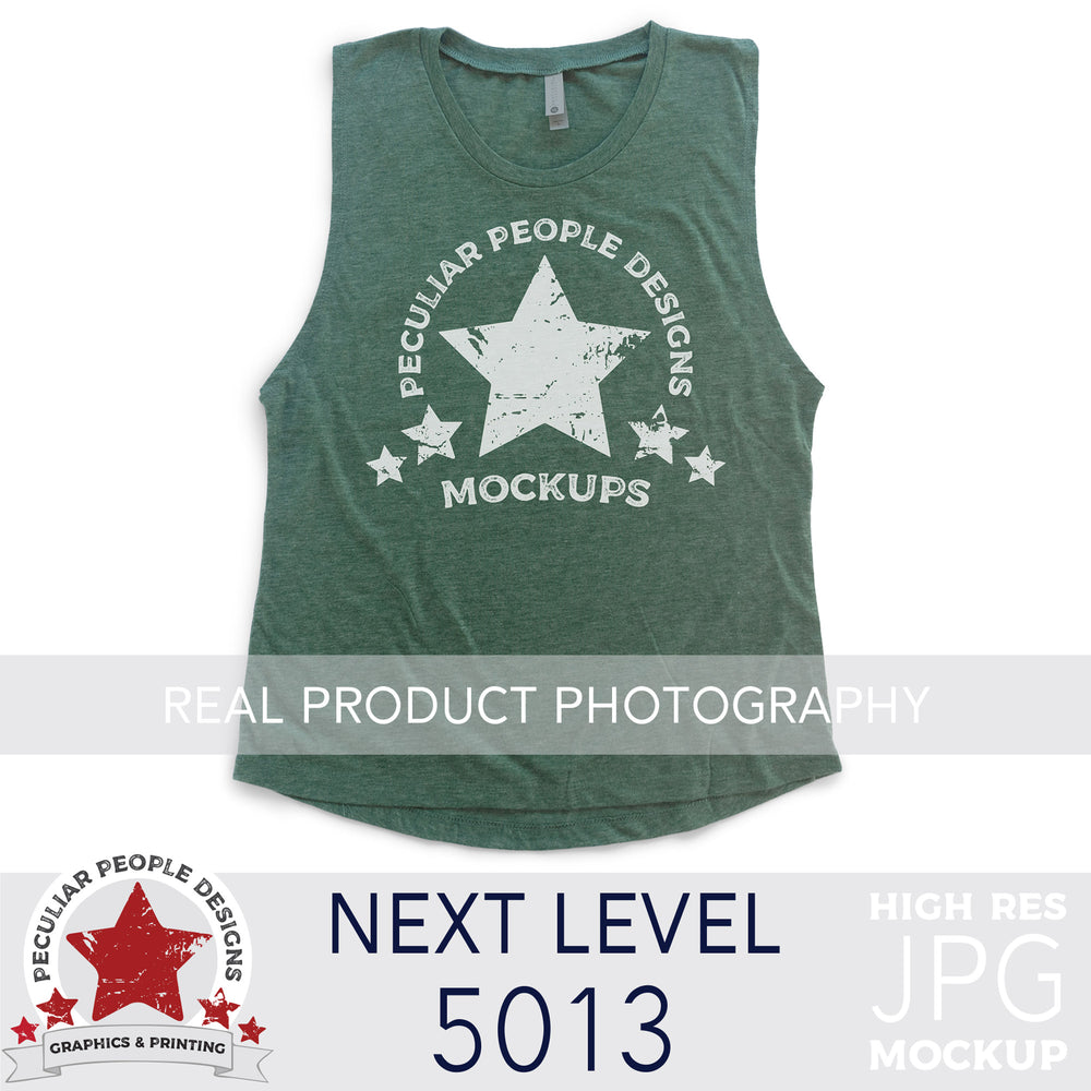 
                  
                    a Royal Pine, next level 5013 muscle tank flat lay mockup with a white background by peculiar people designs
                  
                