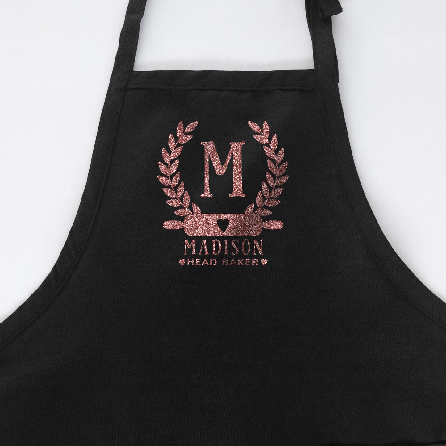 
                  
                    a personalized monogrammed baking apron in black
                  
                