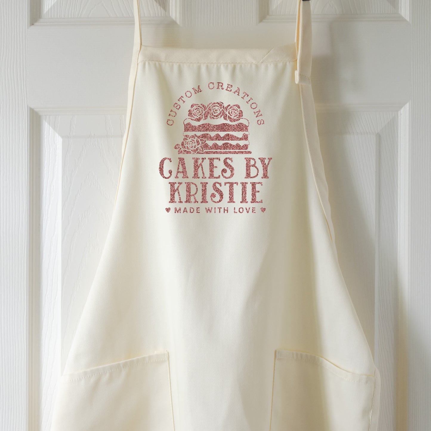 
                  
                    a personalized cake baking apron in natural
                  
                