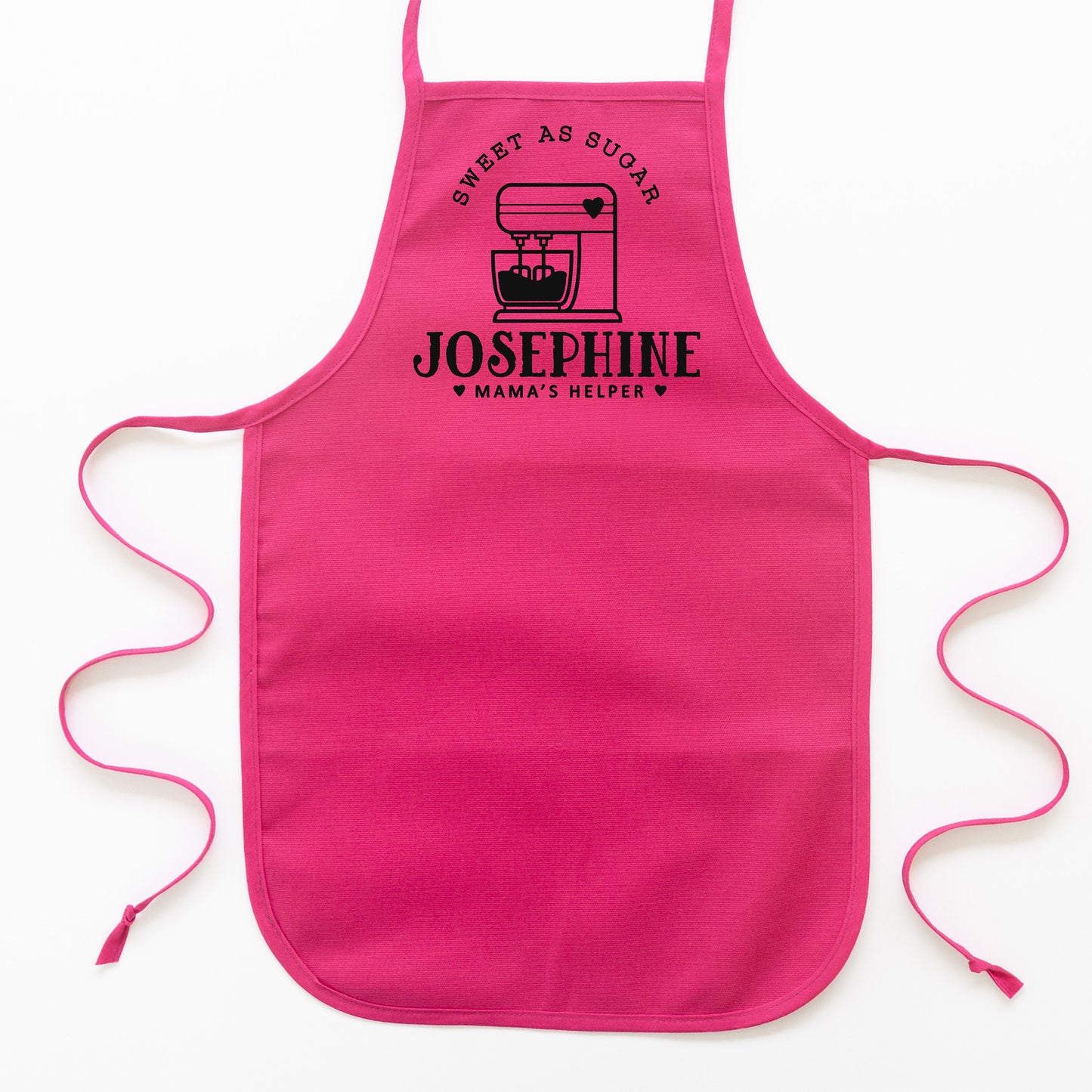 
                  
                    a toddler personalized baking apron in hot pink
                  
                