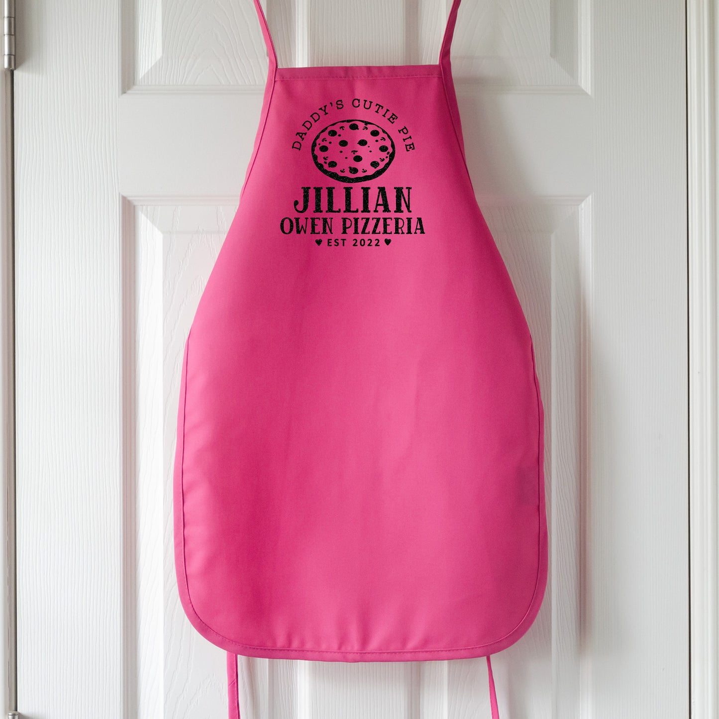 
                  
                    Kid's personalized pizza apron in hot pink
                  
                
