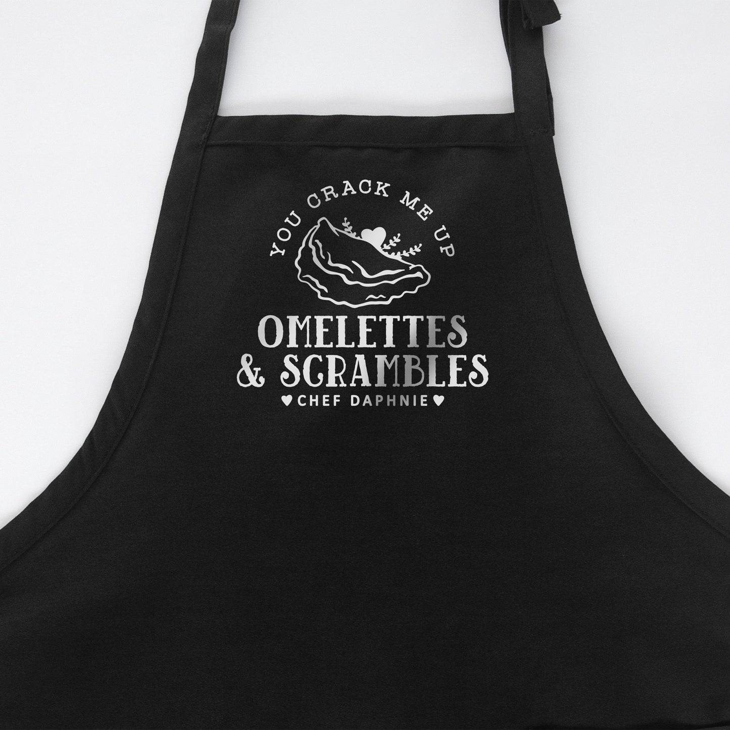 
                  
                    a personalized omelette apron in black
                  
                