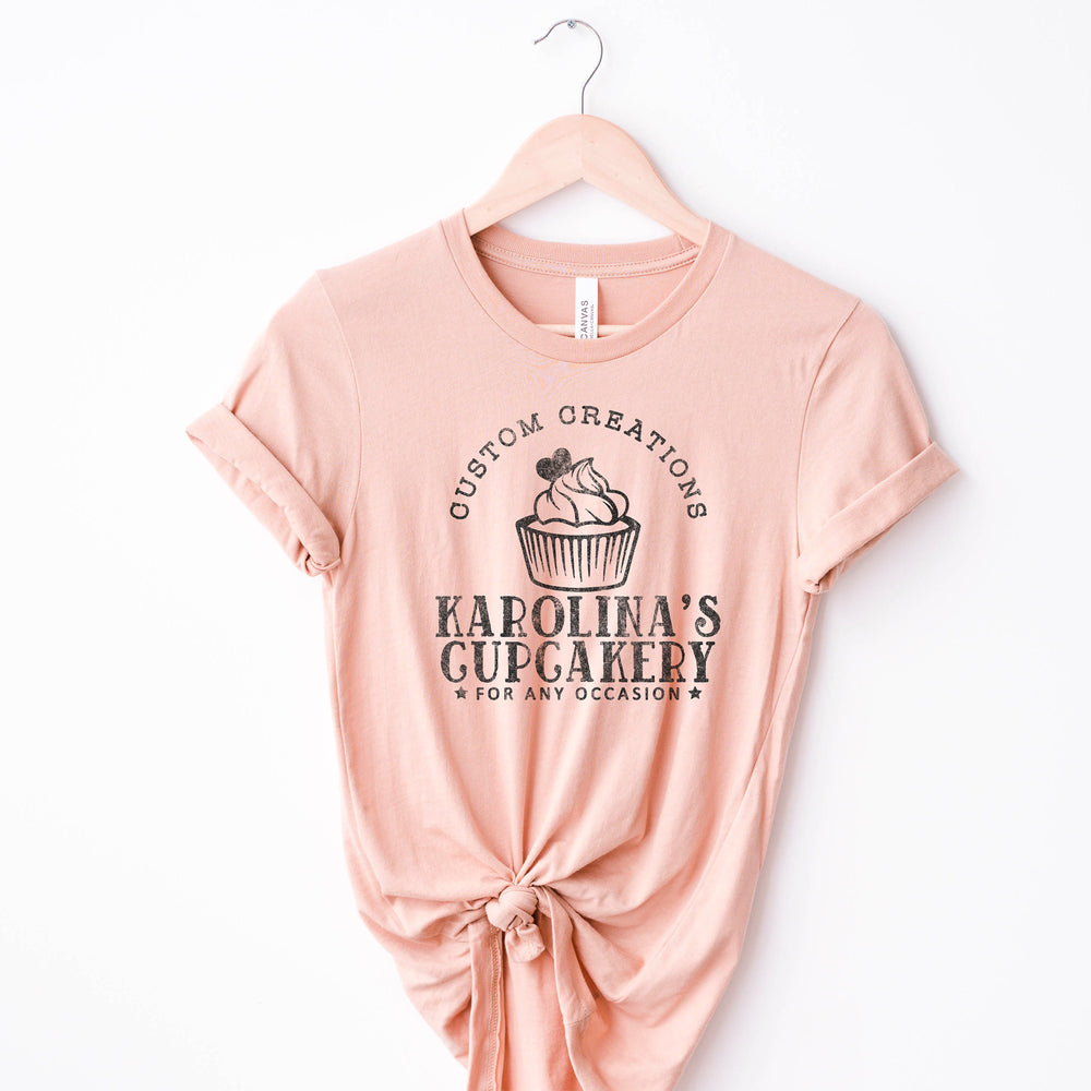 a personalized cupcake baker shirt in peach