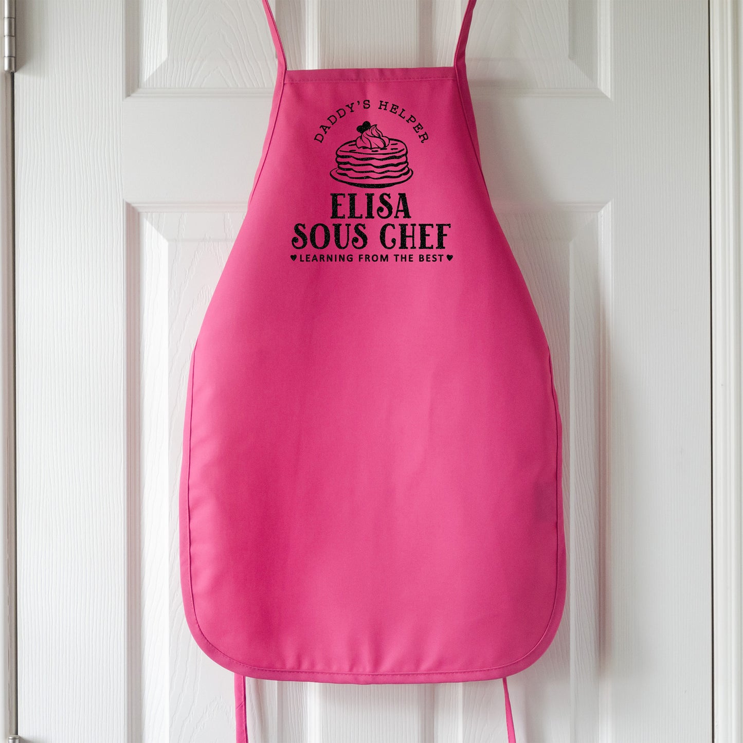 
                  
                    a personalized pancake apron in hot pink
                  
                