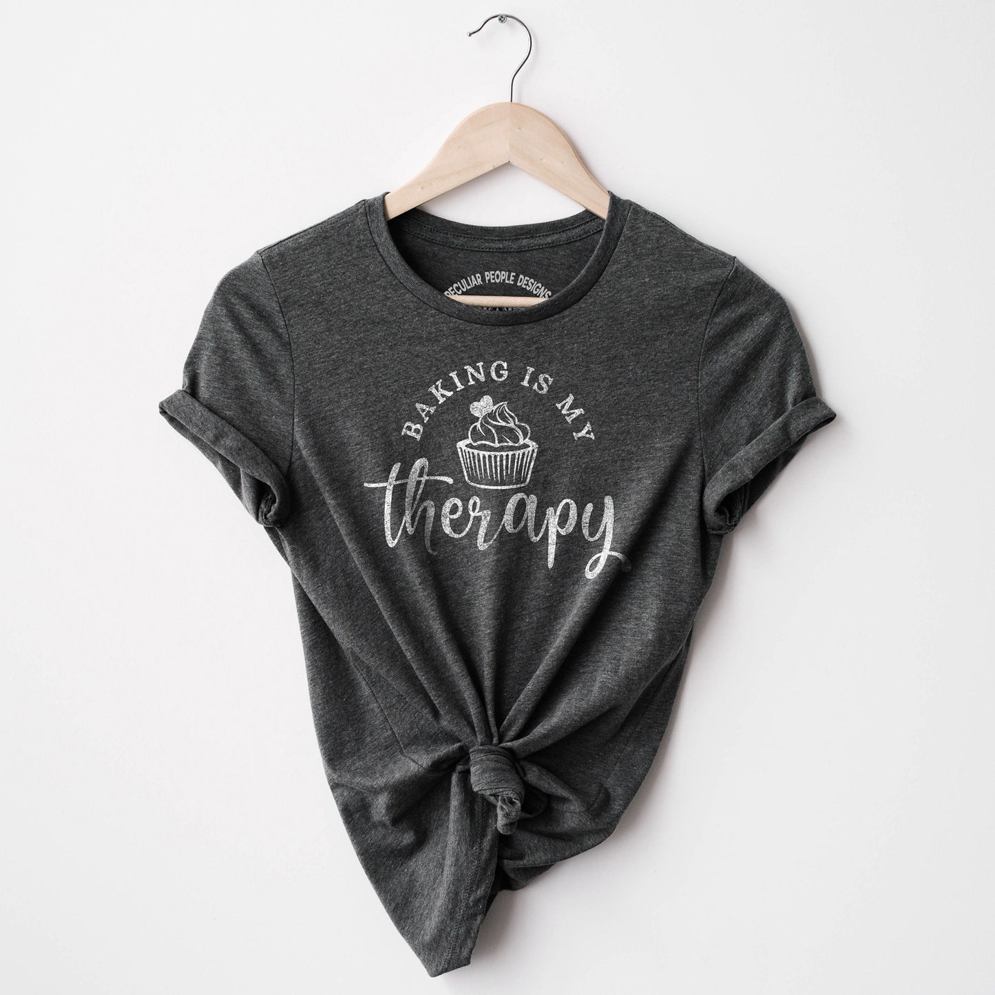 
                  
                    a baking is my therapy shirt in dark grey
                  
                