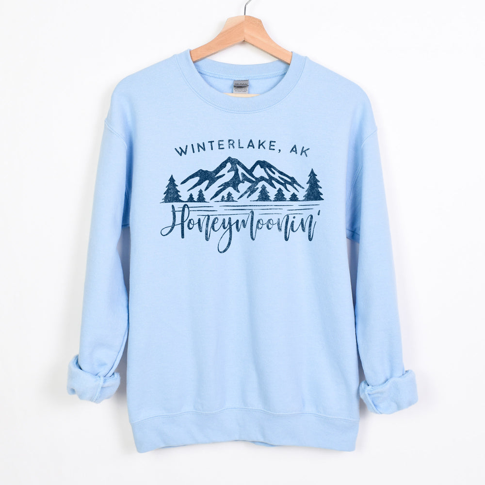 
                  
                    a honeymoonin' custom location sweatshirt in light blue
                  
                