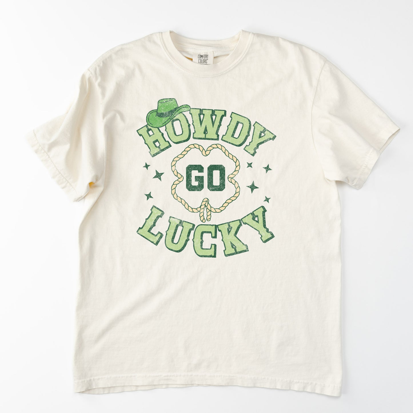 
                  
                    a retro st. pattys day, howdy go lucky tee in Ivory
                  
                