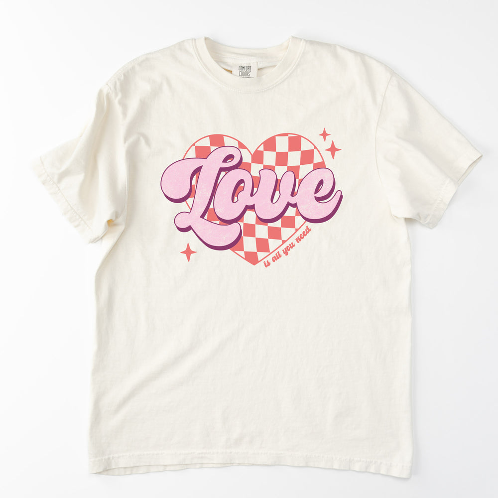 
                  
                    a retro Valentine's Day, love is all you need, comfort colors tee in Ivory
                  
                