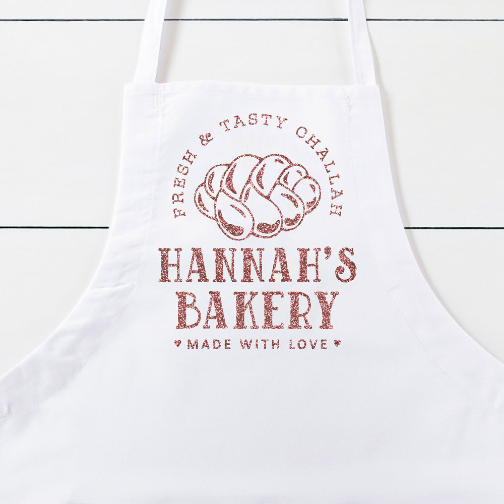 
                  
                    a personalized challah baking apron in white
                  
                