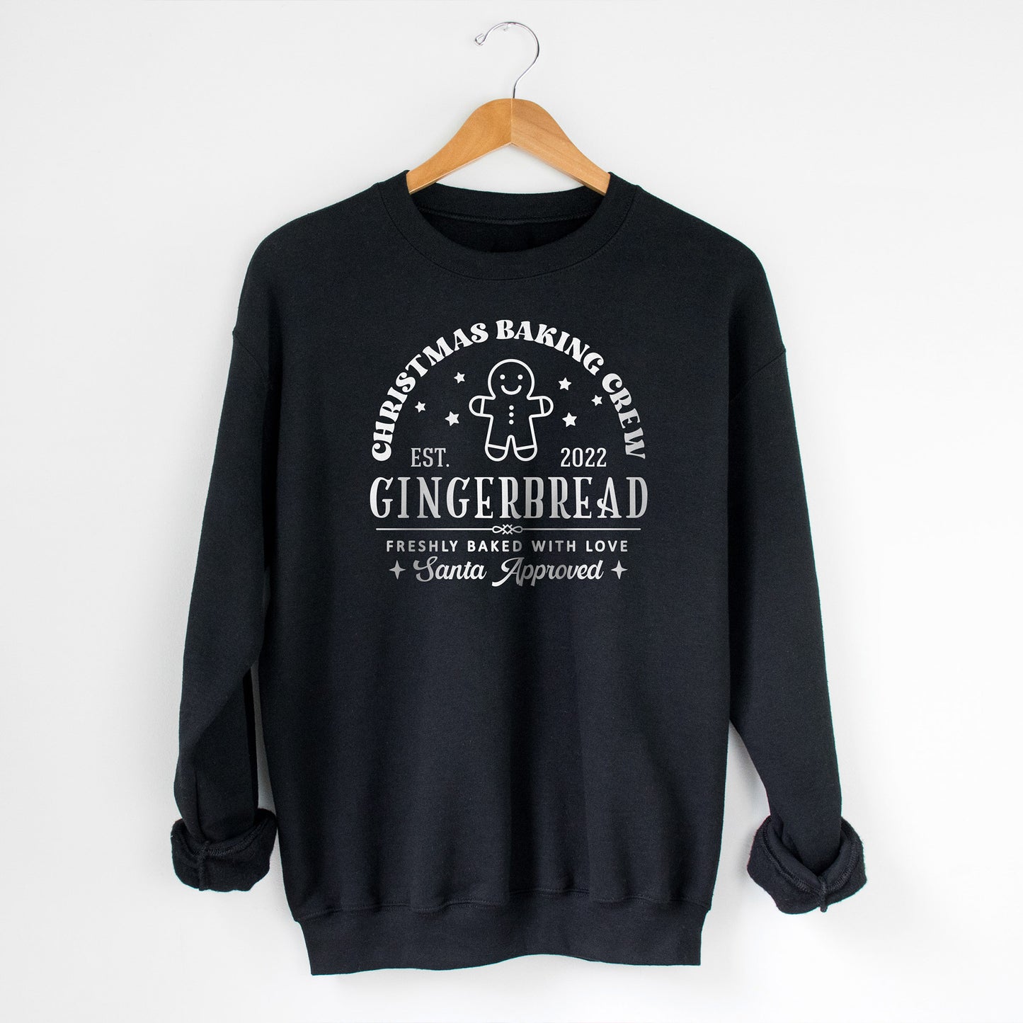 
                  
                    a customizable christmas baking crew sweatshirt in black
                  
                