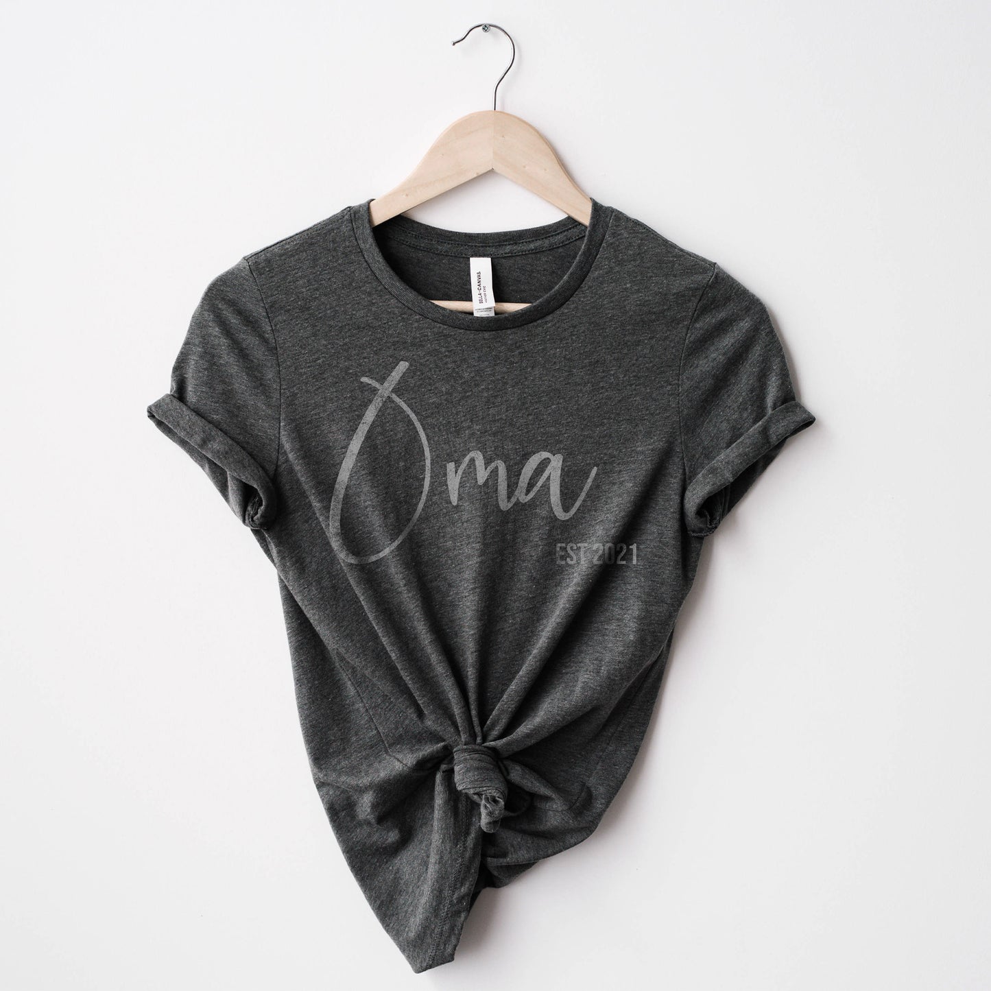 
                  
                    a personalized grandma name shirt in dark grey
                  
                