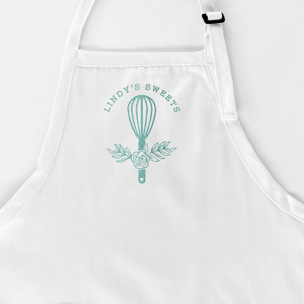 
                  
                    a customized chef apron in white
                  
                