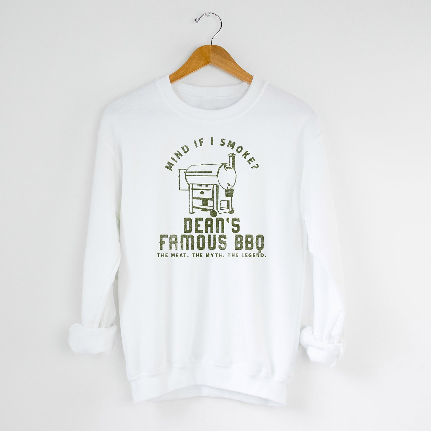 
                  
                    a personalized traeger inspired sweatshirt in white
                  
                