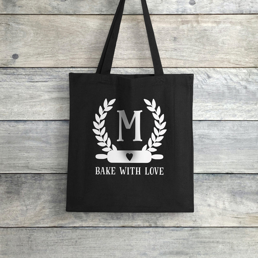 
                  
                    a personalized baking monogram tote in black
                  
                