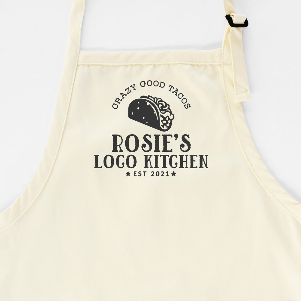 
                  
                    a personalized taco apron in natural
                  
                