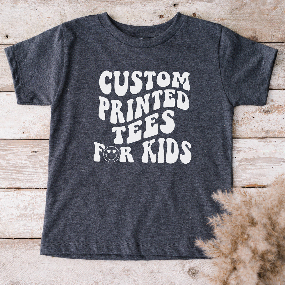 
                  
                    a custom printed kid's shirt in navy
                  
                
