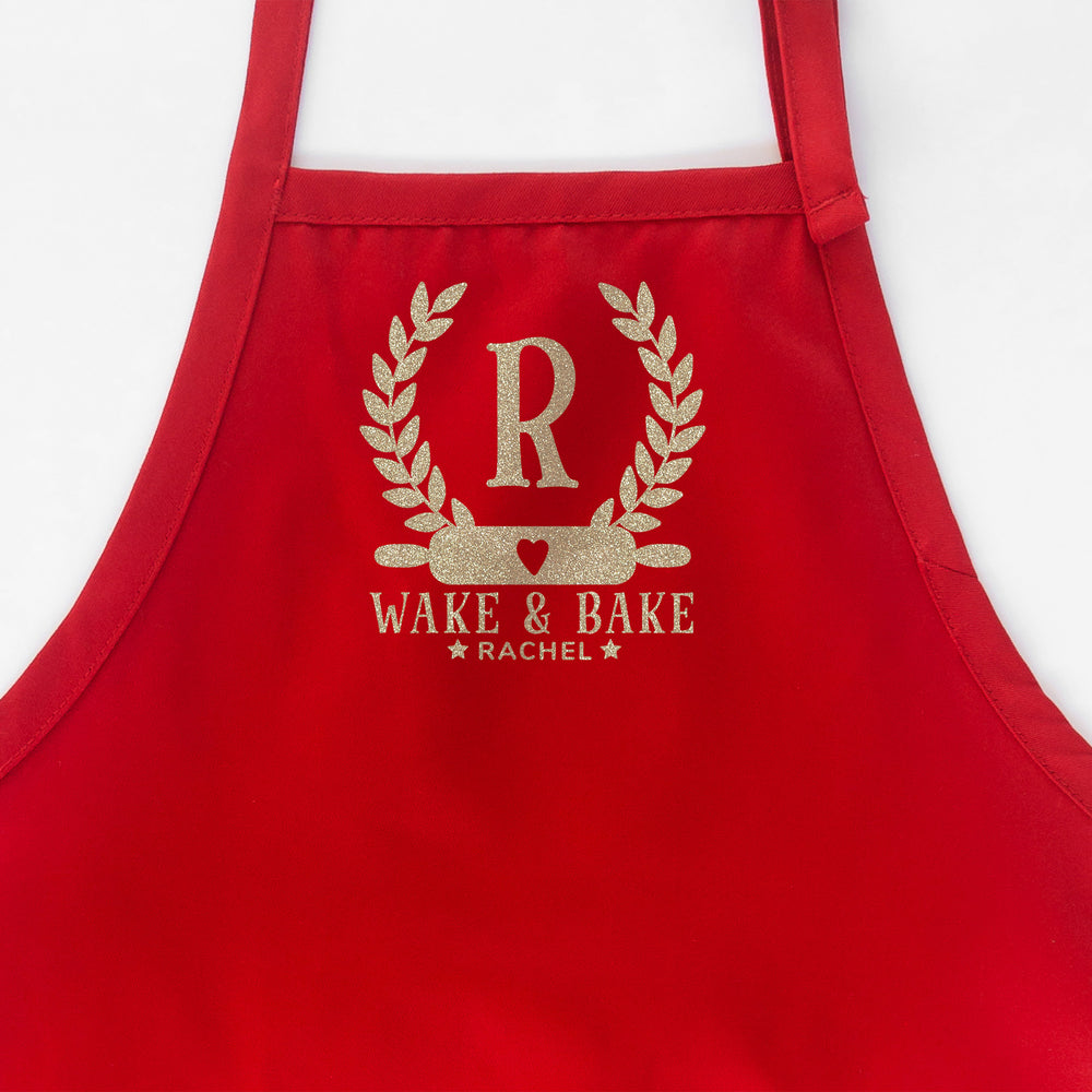 
                  
                    a personalized monogrammed baking apron in red
                  
                