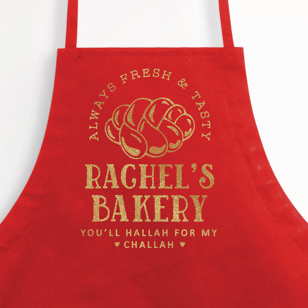 
                  
                    a personalized challah baking apron in red
                  
                