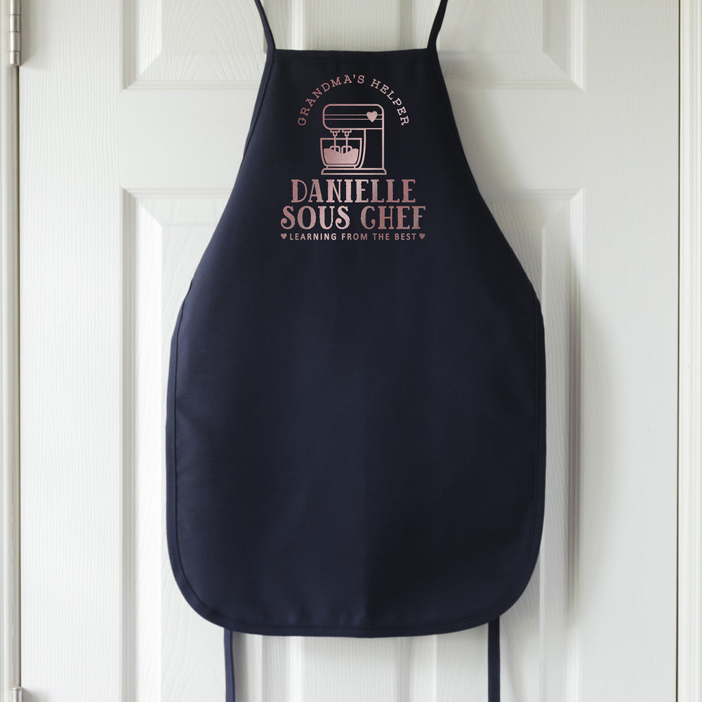 
                  
                    a kids personalized baking apron in navy
                  
                