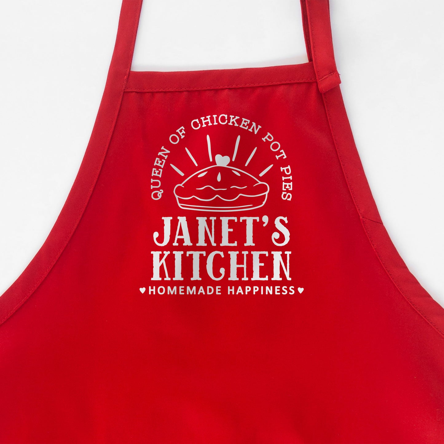 
                  
                    a personalized pie baking apron in red
                  
                