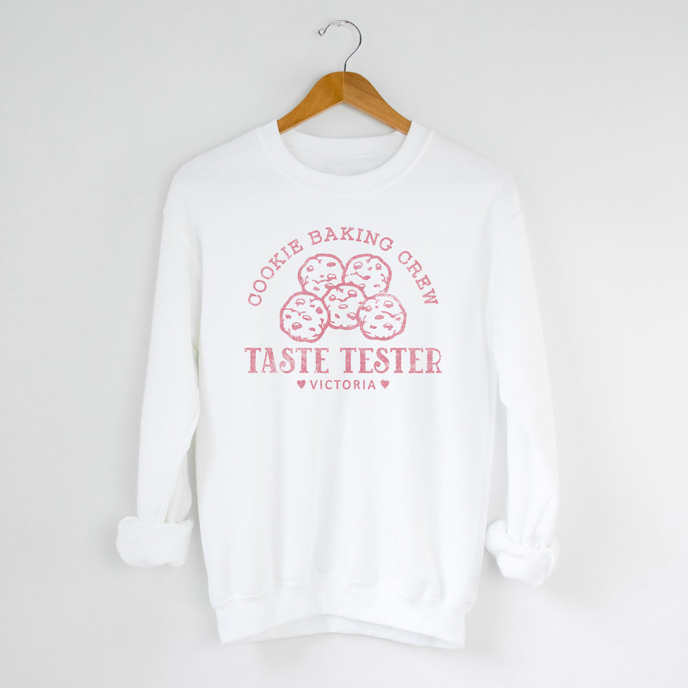 
                  
                    a personalized cookie baker sweatshirt in white
                  
                